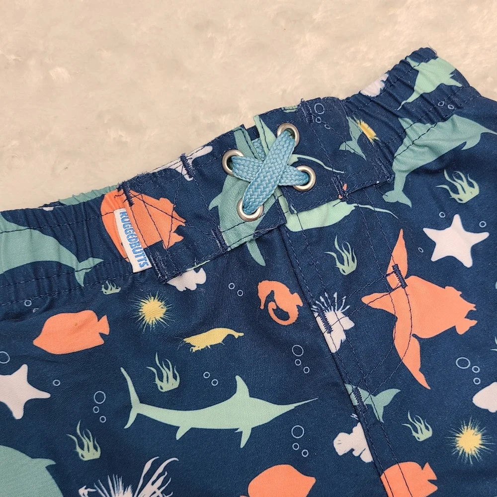 RuggedButts swim trunks and rashguard size 6-12 months